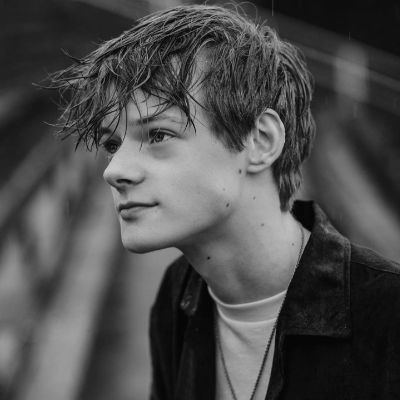 Cory Gruter Andrew posing for a picture on his Instagram captioned "Rainy Days."